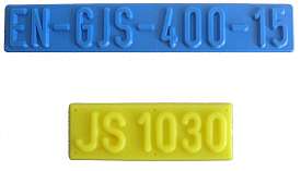 Sonderzeichen 'Guss-Qualität' aus blauem Kunststoff, zum Aufkleben